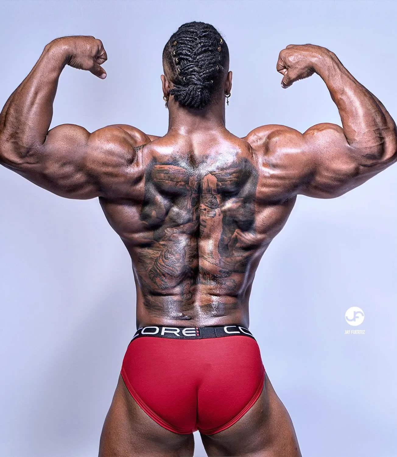 Back study of Texas Shyboy showing his tattoo work